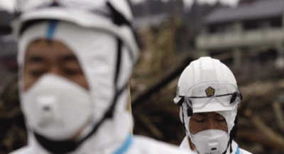 “东电表示,正采取清理受污染土壤、在储水罐周围增加沙袋等方式阻止污染范围扩大。”